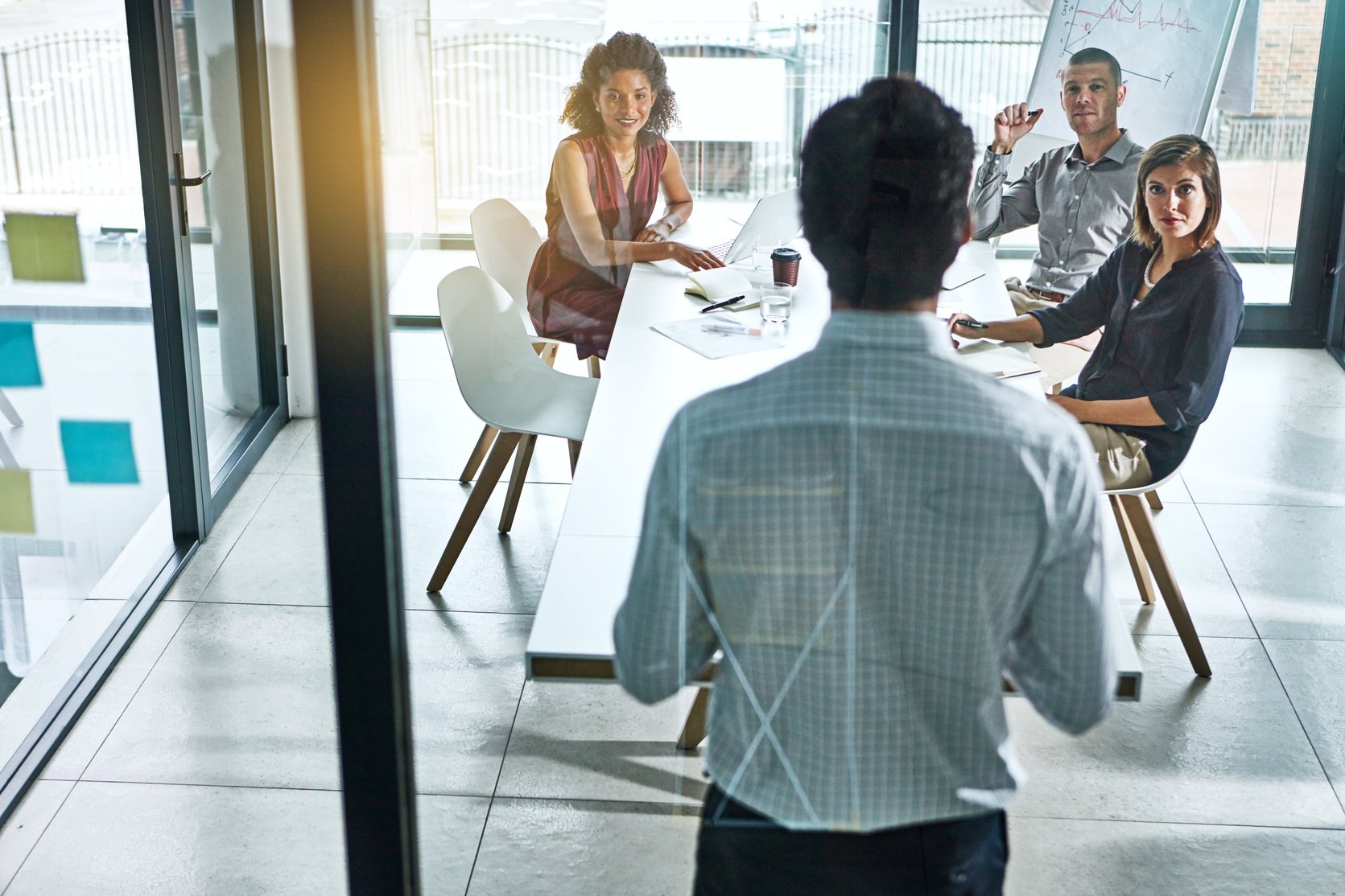 Facilitating his meeting from the front